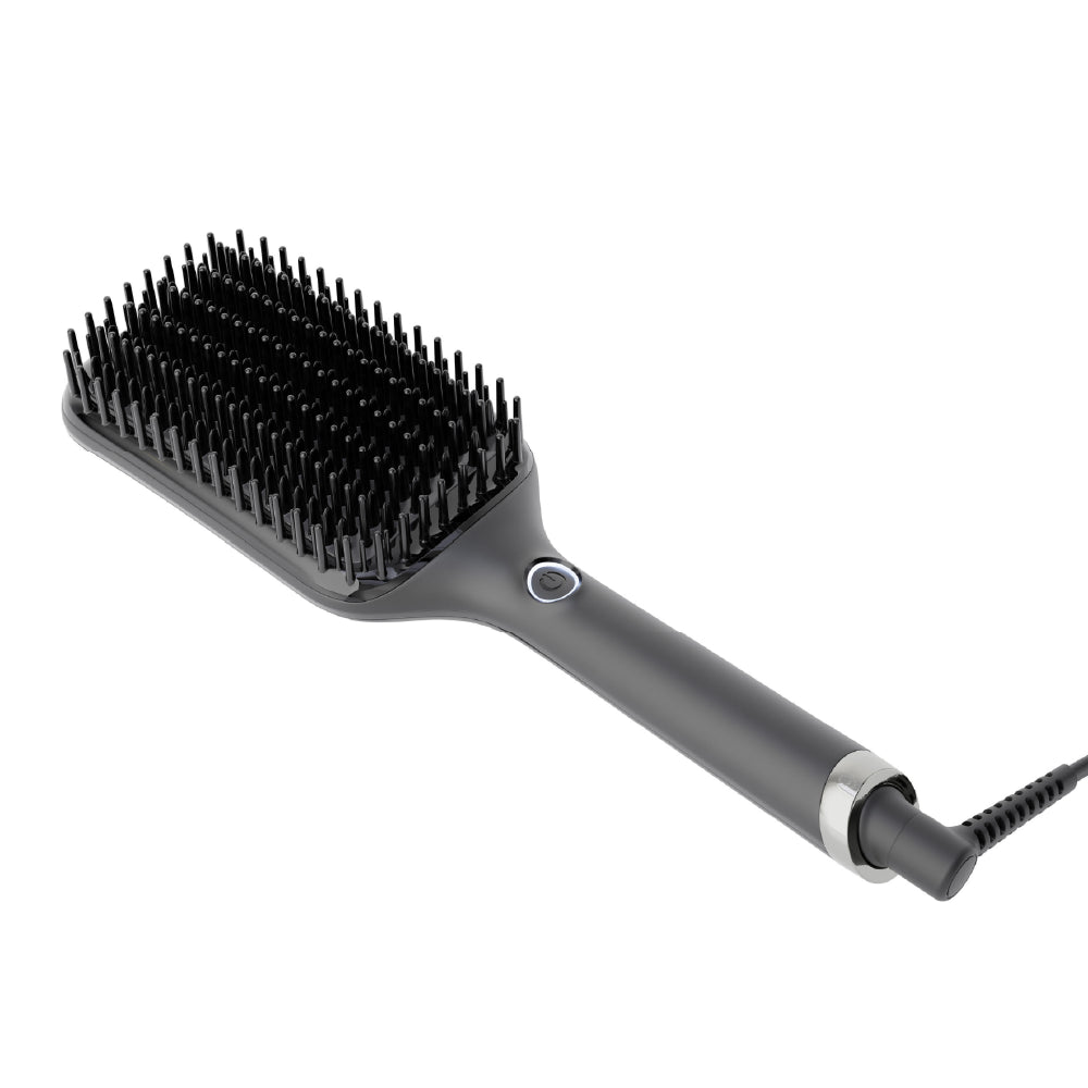 Gray hairbrush with black bristles on a white background
