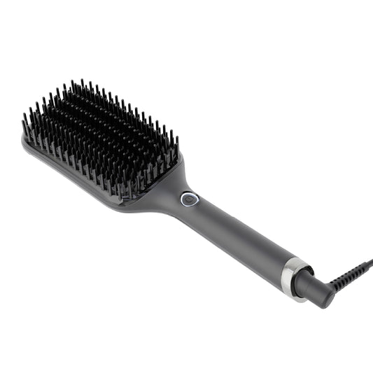 Gray hairbrush with black bristles on a white background