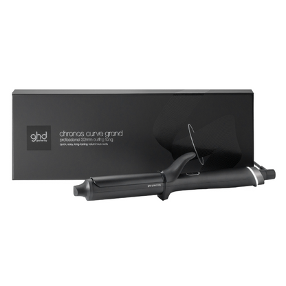 Black ghd curling iron with packaging on a white background