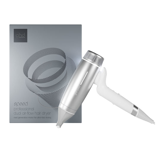 Silver hair dryer with packaging on a white background